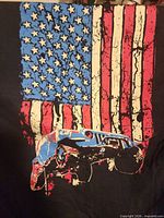 Back view showing large distressed American flag and Jeep graphic