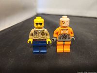 Front view of both minifigures standing upright