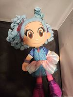Full view of Luna Petunia plush doll