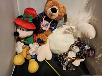 Group shot of four plush toys