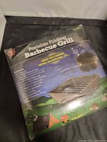 Front of sealed retail box showing product image and branding