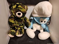 Front view of both plush toys side by side