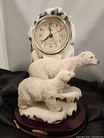 Front view showing polar bears sculpture and clock