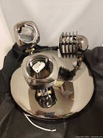 Top view of gunmetal fixture showing three heads and wiring