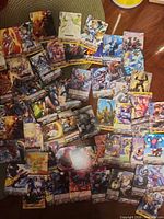 Wide view showing majority of the loose Vanguard cards spread on table