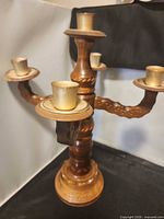 Full view of wooden five-arm candelabra