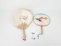 Both fans side by side for overall view and scale