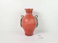 Full front view of red scavo amphora vase with green handles