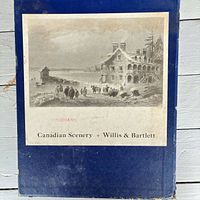 Front of blue slipcase showing mounted illustration and title