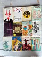 Ten paperbacks laid out, showing titles such as The Devil in Massachusetts and Brave New World