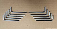 All ten identical chrome 5 mm hex keys laid out