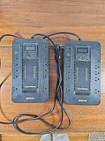 Two CyberPower 850VA UPS units with cords visible