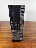 Front view showing Dell OptiPlex 9010 SFF case with optical drive, USB and audio ports