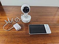 Overall view of camera, parent monitor, and power adapter