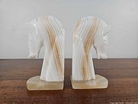 Front view of both onyx horse head bookends