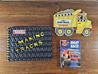 All three board books arranged on wooden surface