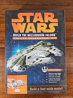 Front of boxed Star Wars Build the Millennium Falcon Deluxe Papermodel Kit