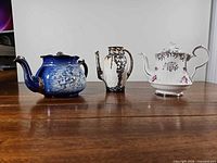Group shot of three teapots