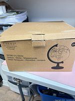 Closed Exerz Topglobe carton showing model and size