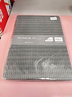 Sealed grey woven case in plastic showing label For 2022 Air 13" A2681/A3113