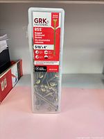 Front view of plastic box showing GRK RSS label and screw size