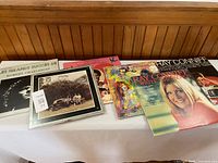 Group shot of all six LPs showing front covers
