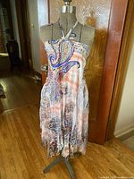 Front view of sleeveless summer dress on mannequin