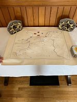 Full view of the unfolded WWII Canadian Corps Signals map on table