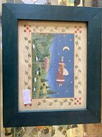 Front view of framed print showing artwork and frame color/condition