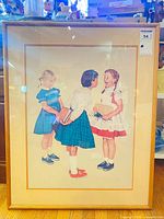 Front view of framed Norman Rockwell print showing artwork, mat and frame