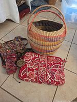Group shot showing straw basket and all fabric bags