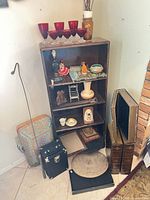 Full view of bookcase with surrounding items