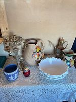 Group shot showing all items on lace-covered table