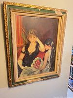 Full view of framed painting on wall