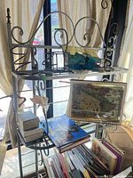 Front view of shelf with books and decor