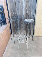 All three metal plant stands grouped for size comparison