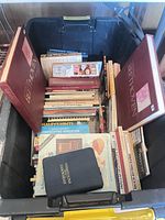 Top view of tote showing packed books including two large Beethoven hardcovers, various reference titles