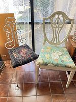 Both chairs side by side showing design, upholstery and condition