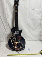 Full front view of Guitar Hero III wireless guitar controller