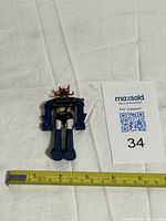 Full view with tape measure indicating roughly 4 inches