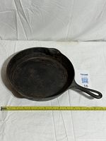 Top view of cast iron skillet showing overall condition and handle
