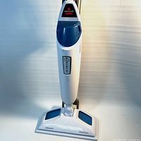 Front view of Bissell PowerFresh 1940A steam mop showing water tank and mop head