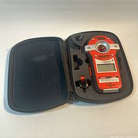 Open case showing BDL190S unit and accessories