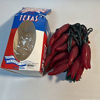 String lights bundled beside original box