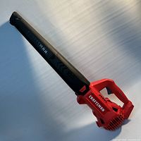 Full view of Craftsman V20 leaf blower with tube attached