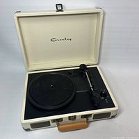 Open suitcase showing Crosley turntable interior