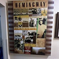 Front view of Ernest Hemingway themed canvas print showing collage design and overall condition