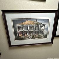 Front view of framed architectural print showing image, matting and frame