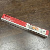 Closed Jenn-Air rotisserie kit box full length