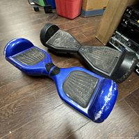 Both hoverboards side by side showing overall condition